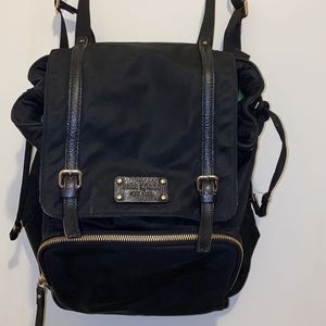 KATE SPADE black mini backpack with green interior lining